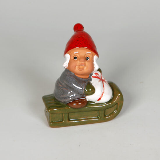 Micro nissebarn på kjelke - Rolf Berg